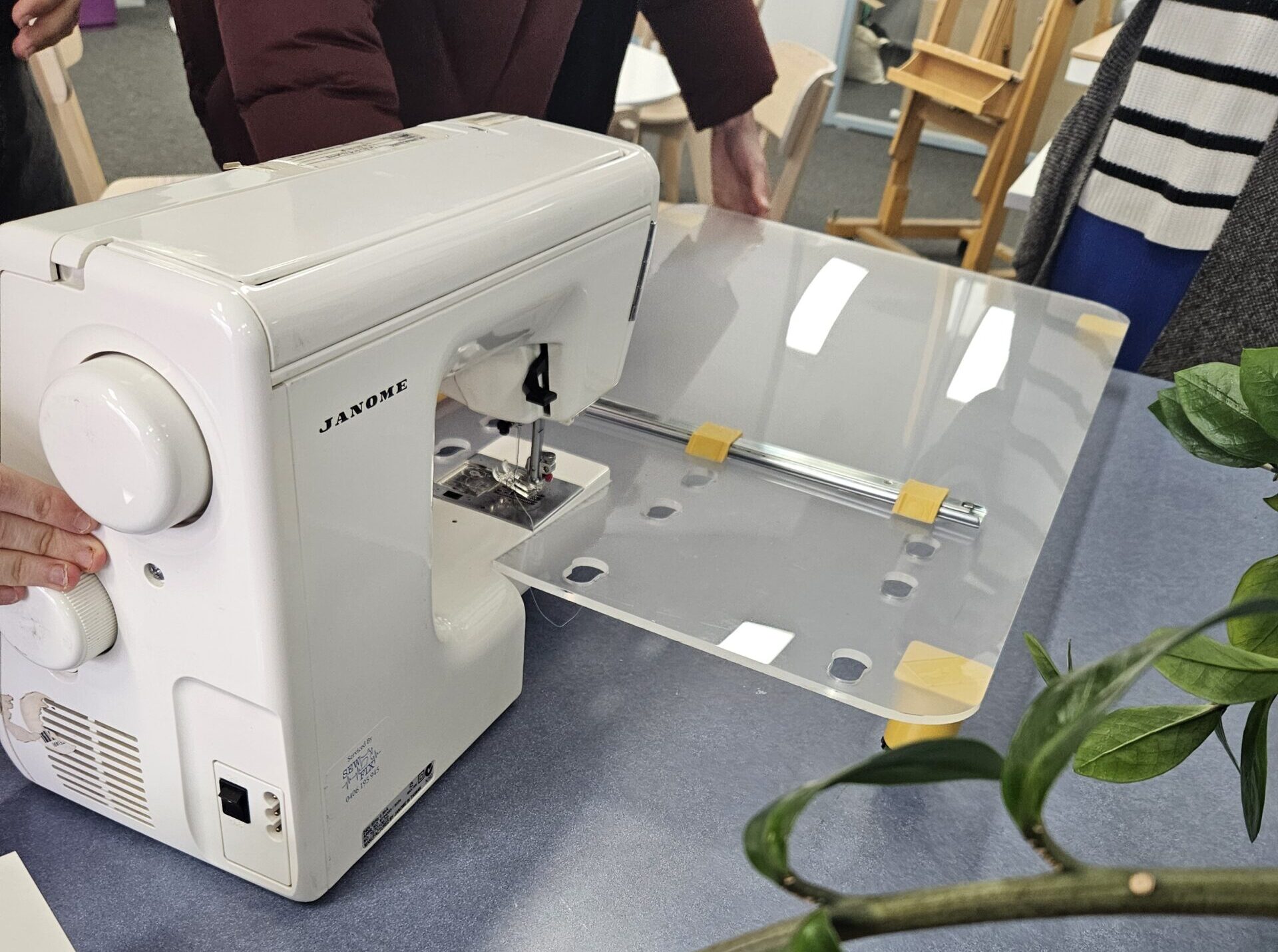 Sewing machine with extension table.
