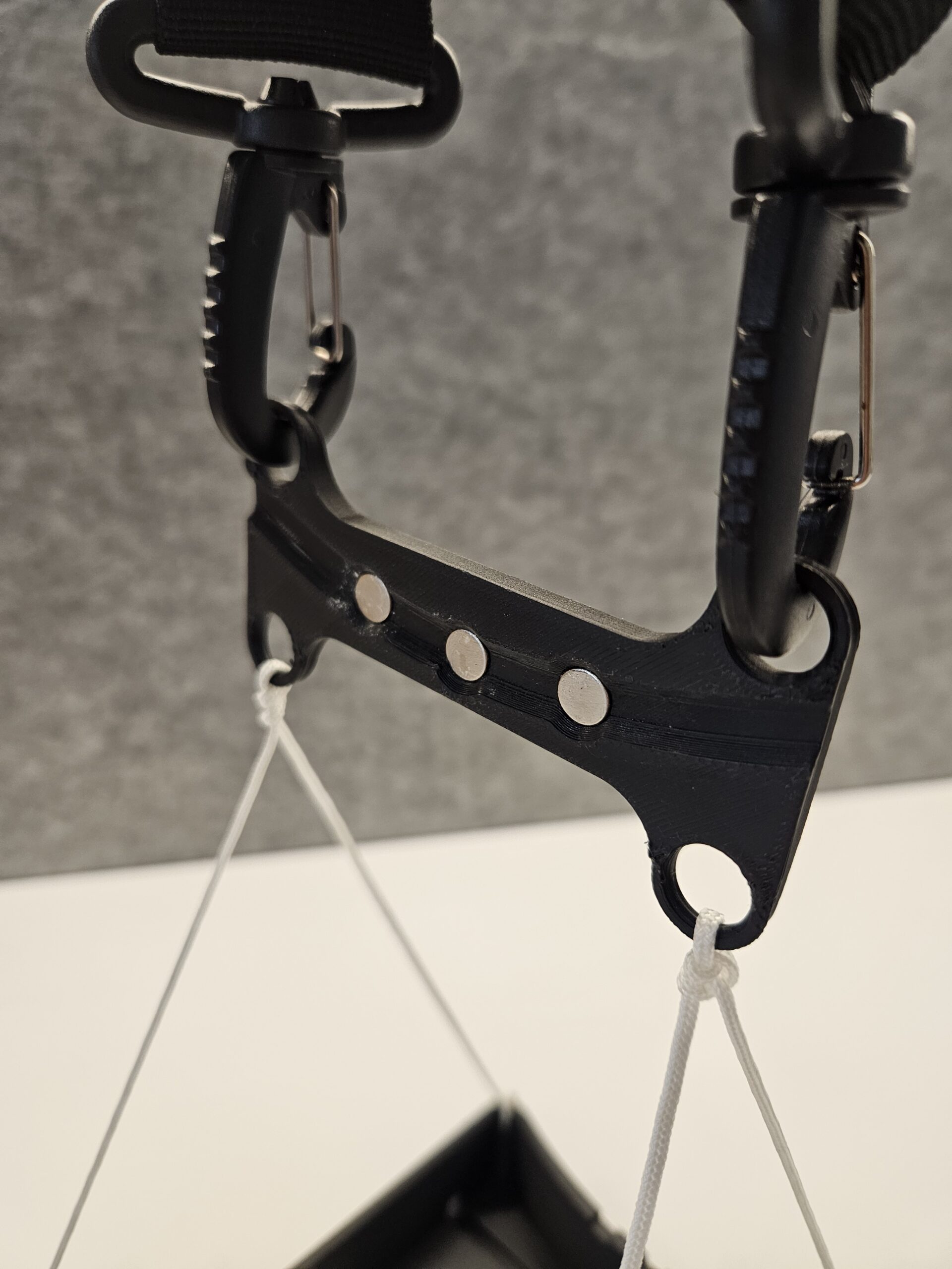 Close up view of the magnetic stowing feature of the Lawn Bowls Aid