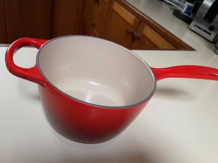 Red Le Creuset pot.