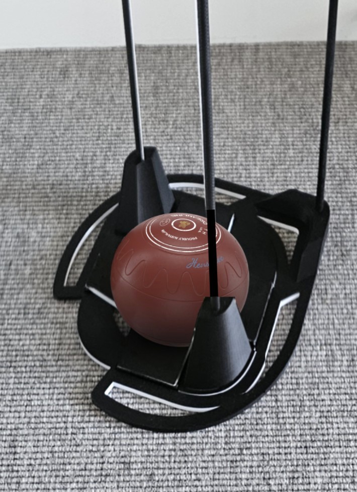 close up view of bowl sitting in base of the powered bowls lifter